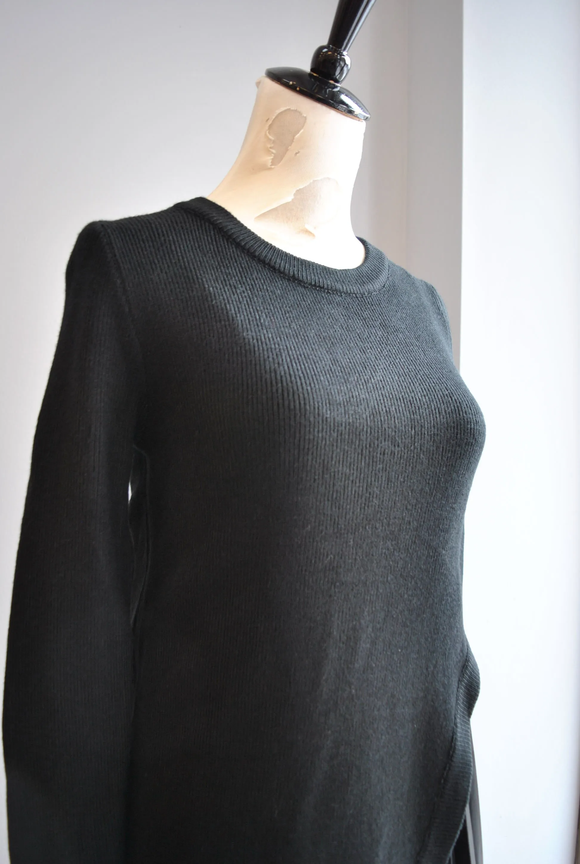 CLEARANCE - BLACK SWEATER DRESS WITH FAUX LEATHER PLEATED SLIP