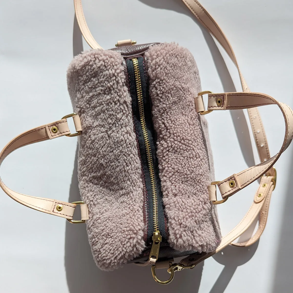 Mini Duffle in Lilac Shearling, Wine, and Vegetable Tanned Leather with Strap