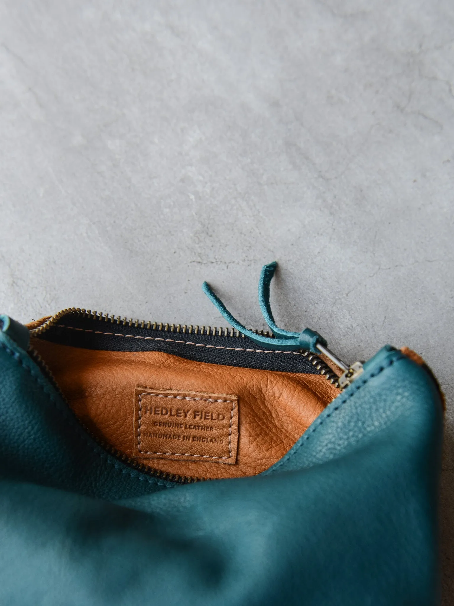 TEAL CHEETAH CONTRAST POUCH